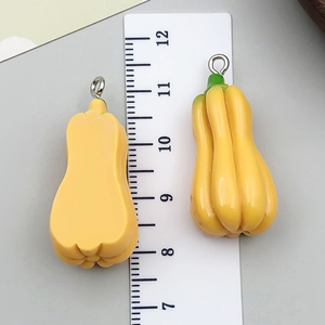 Miniature yellow pumpkin resin pendants with silver hooks for DIY jewelry making