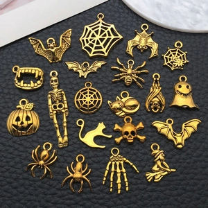Golden Halloween DIY charm set with pumpkin and skull alloy pendants for jewelry making