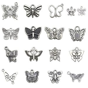 Set of 16 vintage silver alloy hollow butterfly charms for DIY necklace making