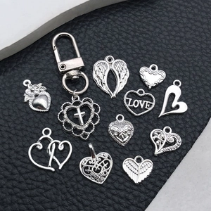 Set of silver alloy heart pendants and charms for DIY jewelry making and necklaces