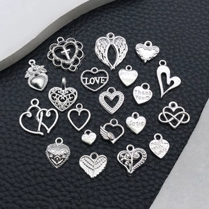 Silver alloy heart pendants for DIY jewelry with various engraved designs and wings