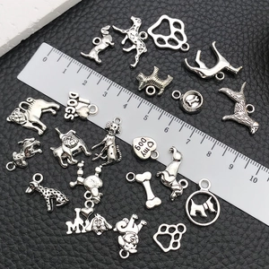 Antique silver dog charms set for DIY jewelry making featuring bone and paw patterns