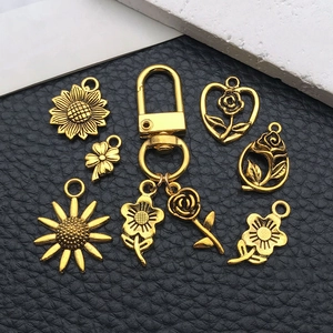 Antikgoldenes Blumen-Anhänger-Set mit Sonnenblumen und Rosen für DIY-Schmuckkreationen