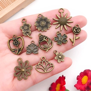 Antique bronze flower pendants in various rose and sunflower shapes for DIY jewelry making
