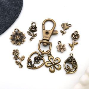 Vintage bronze flower pendant set with sunflower and rose charms for DIY jewelry making