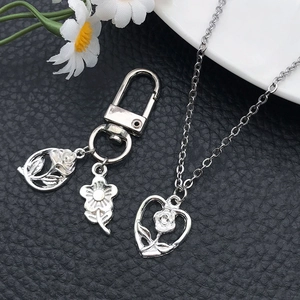 Ciondoli rosa e girasole in lega d'argento con collane a cuore coordinate