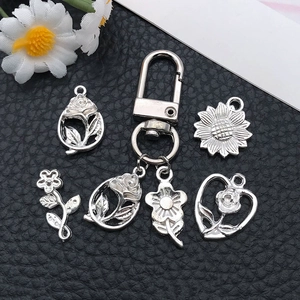 Set di ciondoli floreali in argento con girasole e rosa per gioielli fai da te e portachiavi