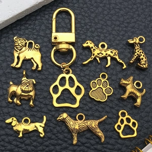 Golden alloy vintage dog charms and paw pendants for DIY jewelry making sets