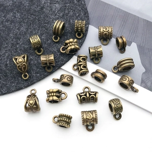 Perles intercalaires et bélières en alliage de bronze antique pour bijoux DIY