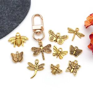 Antique gold alloy insect pendant set including butterfly and bee charms for DIY jewelry