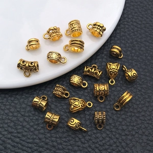 Antique gold spacer beads and tube pendants with embossed patterns for DIY jewelry making