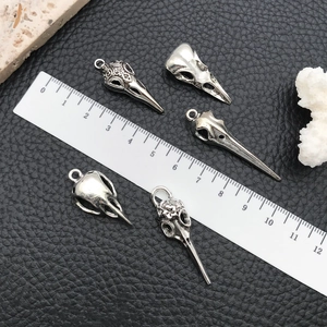 Set of five gothic silver bird skull pendants for DIY jewelry making on leather