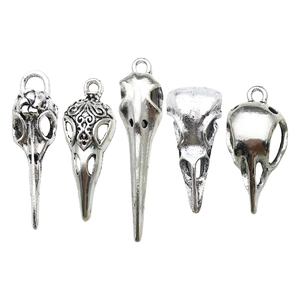 Set of five vintage silver gothic bird skull pendants in zinc alloy for DIY necklaces