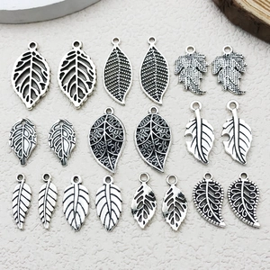 Vue détaillée de breloques feuilles en alliage argenté vintage pour la création de bijoux DIY