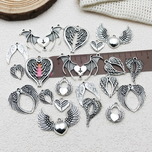 Antique silver punk heart and wing charms for DIY gothic jewelry making and crafts