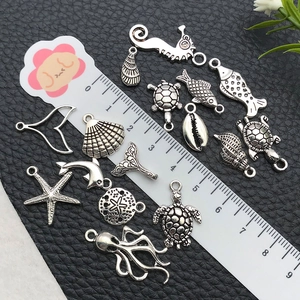Antique silver marine alloy charm set featuring seahorse, starfish and dolphin for DIY jewelry