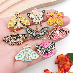 Colorful enamel butterfly pendants for DIY jewelry making sets of eight diverse patterns