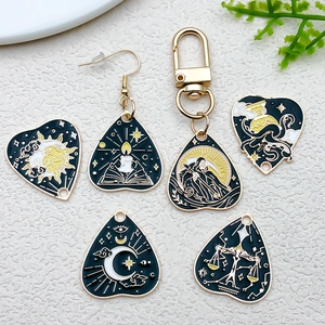Enamel tarot card charms featuring sun and moon designs for DIY jewelry and necklaces