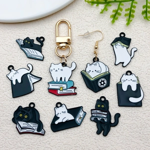 Cartoon black and white cat reading book charms for DIY jewelry making and keychains