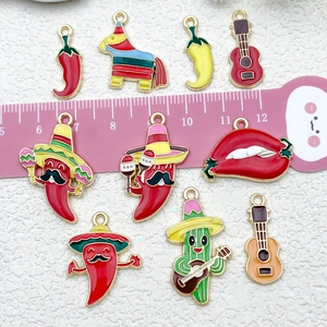 Cartoon Mexican enamel charms set with chili, cactus and pinata on white background