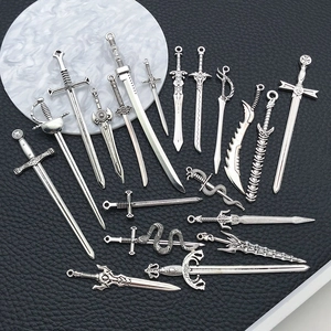 Detailed collection of vintage silver sword alloy pendants for DIY jewelry crafting