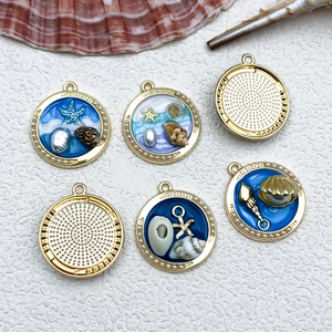 French vintage starfish ocean pendant with gold frame and blue enamel details