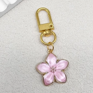 Pink pearlescent cherry blossom keychain with gold alloy cherry pendant for DIY jewelry