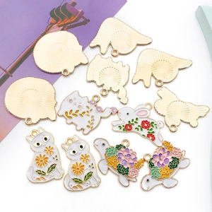 Detail of alloy cartoon animal charms with floral enamel patterns for DIY jewelry making