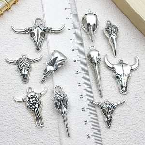 Silver bull and bird skull alloy charms for DIY jewelry making with ruler scale