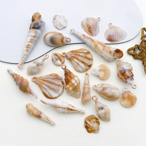 Acrylic sea shell and conch pendants in cream and brown for DIY jewelry making