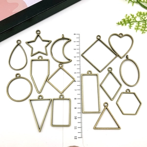 15-piece set of geometric hollow alloy pendant frames for DIY jewelry crafts