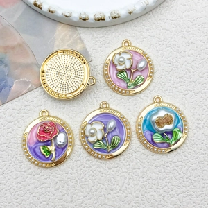 Vintage French flower pendants with colorful enamel roses and gold frames for DIY jewelry