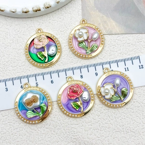 Set of five vintage floral enamel charms with gold metal base and pearl accents
