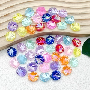 Close-up of iridescent ABS petal-shaped beads with pre-drilled holes for DIY jewelry