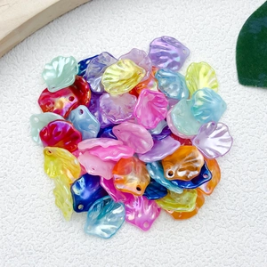 Detailed view of iridescent ABS pearl shell flower petals for DIY jewelry making