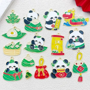 Detailed collection of 14 cartoon enamel charms featuring pandas and rice dumplings
