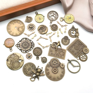 Macro view of vintage bronze steampunk clock gears and charms for DIY jewelry making