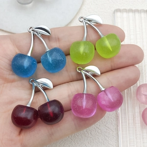 DIY cherry pendant set in resin with silver leaf connector for jewelry making