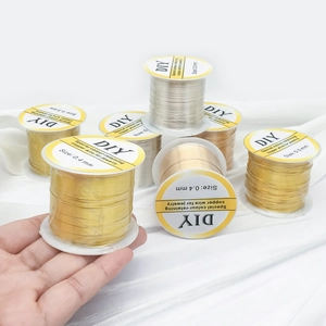 Detalle de hilo de cobre dorado y plateado de 0,3-0,5 mm resistente al deslustre para DIY