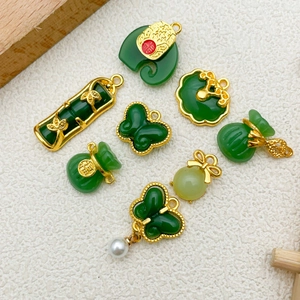 Detailed set of green faux jade and gold-plated alloy pendants for DIY jewelry making