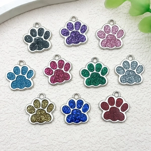 Set of 10 colorful glitter paw pendants in various colors for DIY jewelry and keychains