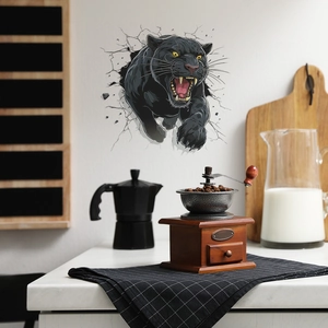 3D wall sticker featuring a fierce black panther breaking through a white brick wall