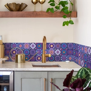 Bohemian purple mandala tile stickers used as a decorative kitchen backsplash display