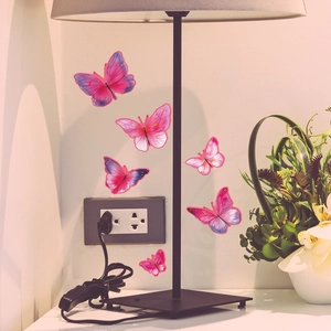 Autocollants muraux papillons roses adhésifs avec effet lumineux déco