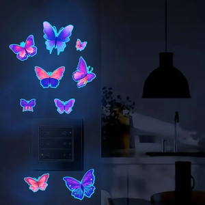 Stickers muraux papillons lumineux pour chambre avec effet néon bleu et design auto-adhésif