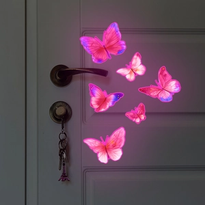 Stickers muraux papillons roses luminescents pour décoration de chambre dans le noir