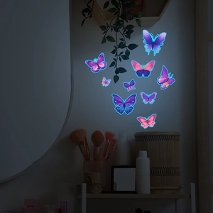 Autocollants muraux papillons lumineux pour déco brillant dans le noir bleu et rose