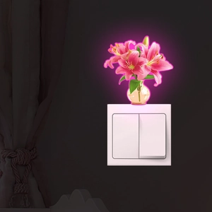 Glow-in-the-dark flower vase wall sticker for light switch decor with pink lily design