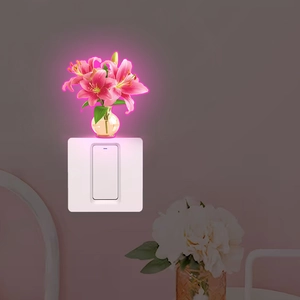 Luminous wall switch sticker with pink lilies for bedroom and living room decor