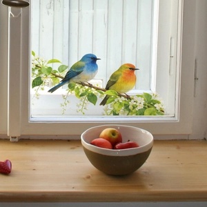 Floral wall sticker with colorful birds on a flowering branch for home window decor
